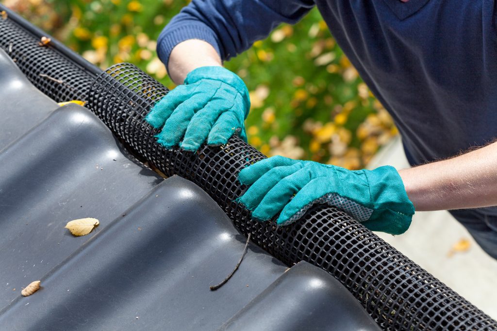 Close-up of aluminium mesh gutter guard fitted along the edge of a Hobart home's roof
